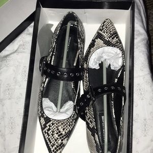 Black and white pointy shoes